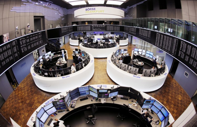 The trading room at the German stock market in Frankfurt, Germany. New regulations pushing more trading onto public exchanges went into effect Wednesday in Europe.