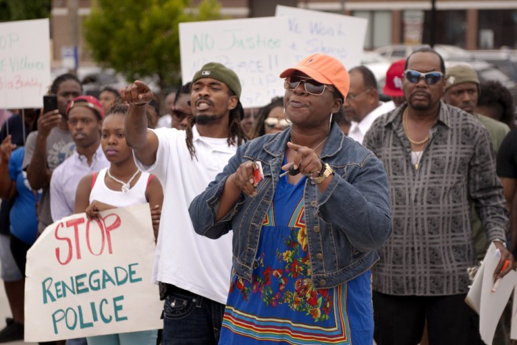Demonstrators rally in 2014 to protest the shooting of Michael Brown, 18, by police in Ferguson, Mo. The shooting prompted national scrutiny of shootings by police and led many law enforcement agencies to examine their use of deadly force. But the numbers for 2017 show no decrease in the number of people killed by police.

