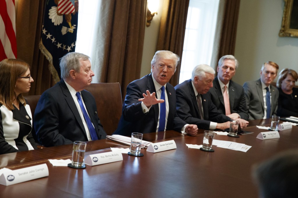 President Trump speaks during a meeting with lawmakers on immigration policy in the Cabinet Room of the White House on Tuesday in Washington.