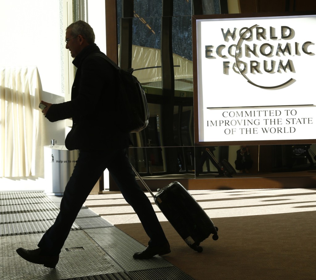 An attendee leaves the Congress Hall during the World Economic Forum in Davos, Switzerland, last year. Trump will be the first sitting U.S. president to attend the meeting since Bill Clinton.