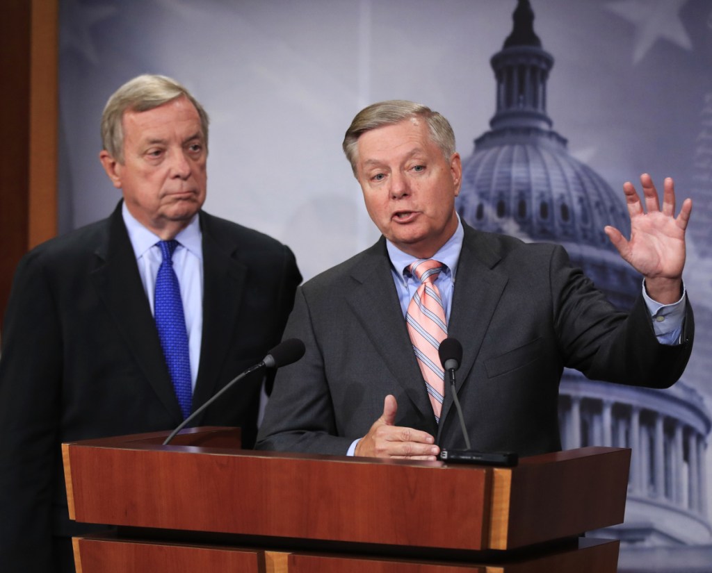 Sen. Lindsey Graham, R-S.C., right, and Sen. Dick Durbin, D-Ill., have put forth an immigration plan that would give young illegal immigrants a path to citizenship and President Trump $1.6 billion for a border wall.