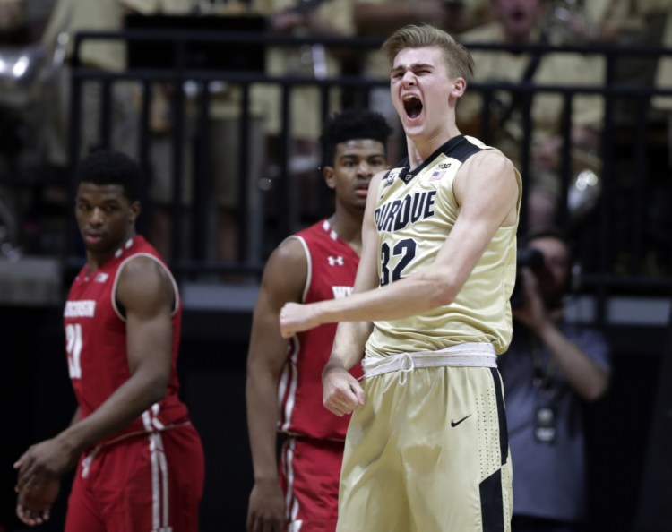 Purdue forward Matt Haarms shows some emotion in the first half of Tuesday's game against Wisconsin in West Lafayette, Ind. The third-ranked Boilermakers cruised to a 70-58 win and improved to 18-2 on the season.