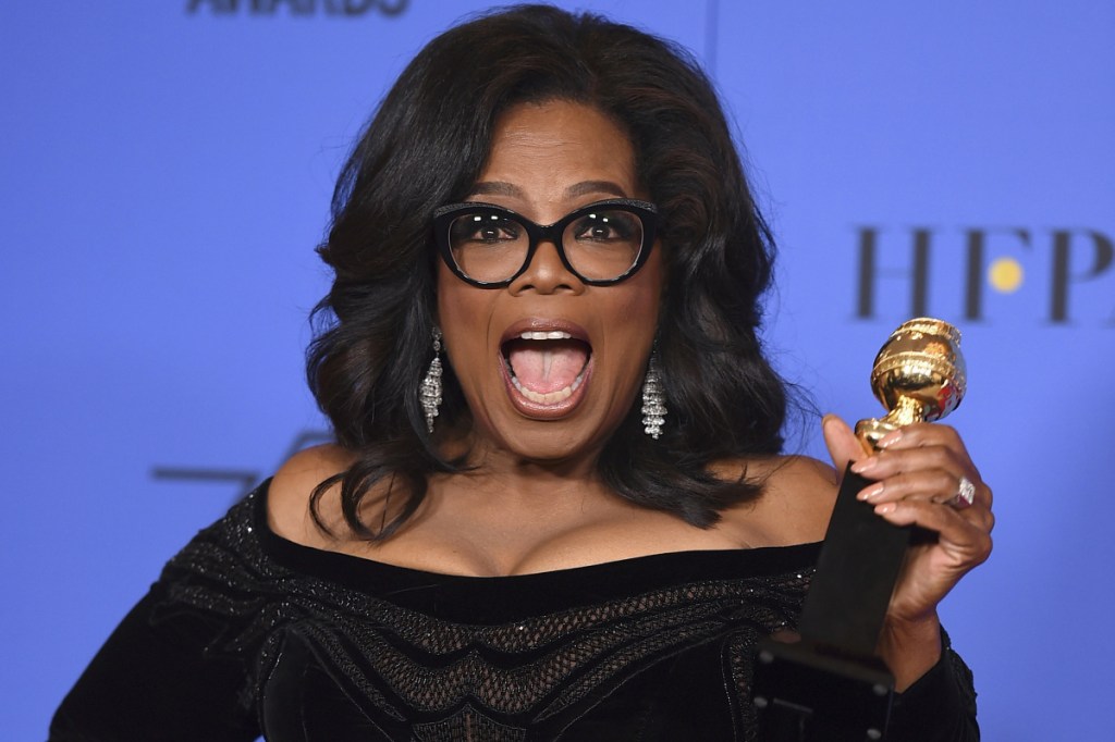 Oprah Winfrey poses in the press room with the Cecil B. DeMille Award at the 75th annual Golden Globe Awards. Stories circulating on the internet about Winfrey saying that old white people need to die are untrue.