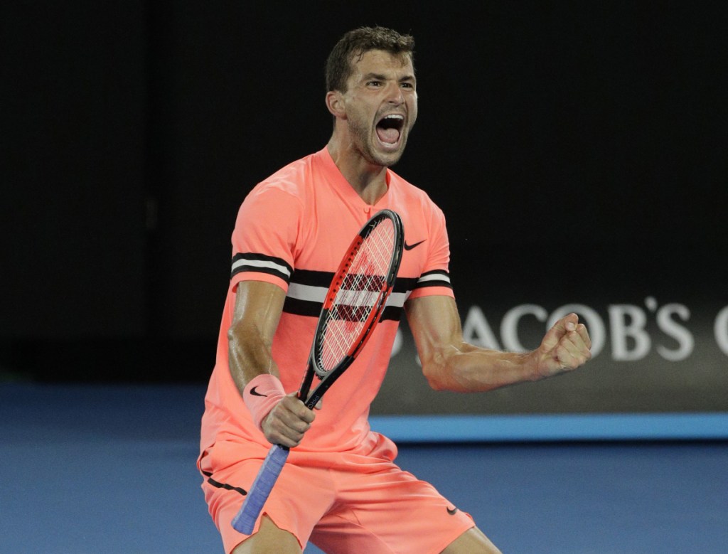 No. 3 seed Grigor Dimitrov celebrates after defeating Nick Kyrgios in four sets Sunday to reach the Australian Open quarterfinals.