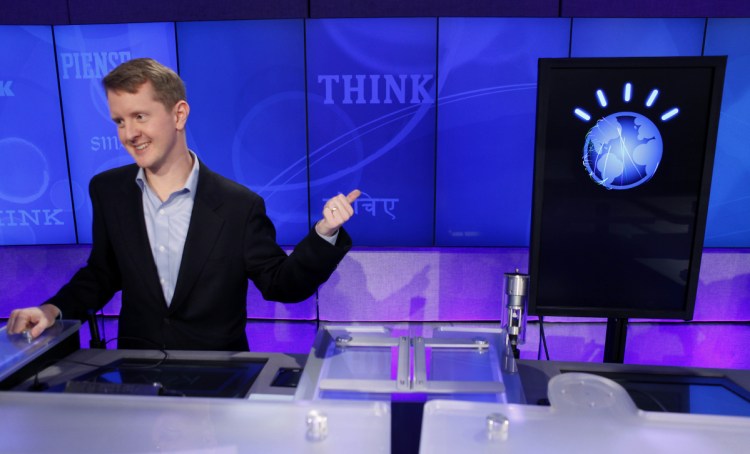 The tech industry has pumped a lot of resources into machine learning since an IBM computer called "Watson," right, bested record-setting "Jeopardy!" champion Ken Jennings, left, in a 2011 competition.