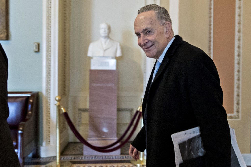 Senate Minority Leader Chuck Schumer, D-N.Y., walks to his office at the U.S. Capitol on Monday, when the Senate voted to end the government shutdown.
