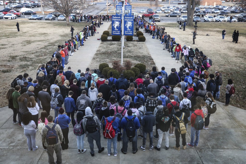 Paducah Tilghman High School held a prayer circle on Wednesday at the school for students at Marshall County High School, where two students were killed and 18 others were injured during a shooting on Tuesday in Kentucky.
