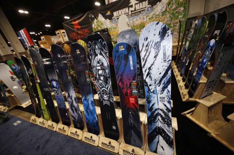 Snowboards are on display at the Outdoor Retailers and Snow Show in the Colorado Convention Center in Denver this week, the largest U.S. trade show for the outdoor and winter sports industries, which represent $887 billion in sales. 