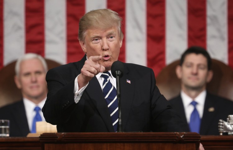 President Trump addresses a joint session of Congress on Feb. 28. His first State of the Union speech comes Tuesday night amid the specter of the special counsel's Russia probe.