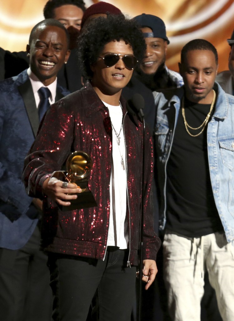 Bruno Mars accepts the award for album of the year for "24K Magic" at the 60th annual Grammy Awards at Madison Square Garden on Sunday in New York.