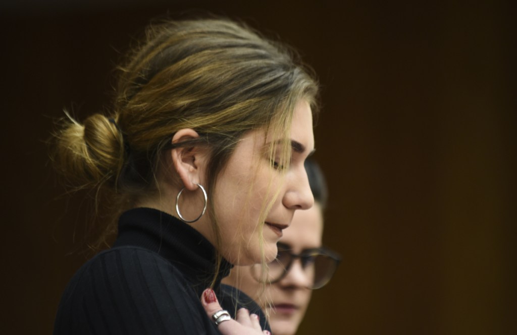 Former gymnast Annie Labrie regains her composure Wednesday, Jan. 31, 2018, while giving her victim impact statement during the first day of statements in Eaton County Circuit Court in Charlotte, Mich., where Nassar is expected to be sentenced on three counts of sexual assault some time next week. Nassar was sentenced to 40 to 175 years in prison in a similar hearing in another county last week. 