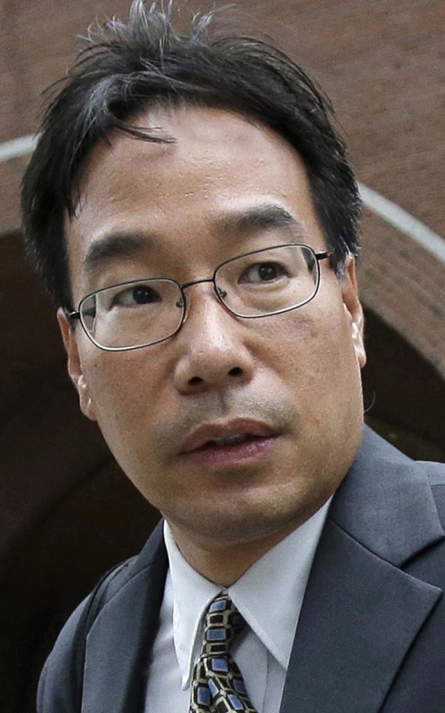 FILE - In this Sept. 19, 2017, file photo, Glenn Chin, supervisory pharmacist at the now-closed New England Compounding Center, leaves federal court in Boston. Chin, a Massachusetts pharmacist charged in a deadly 2012 meningitis outbreak, was cleared in October of second-degree murder charges, but convicted on dozens of other counts. He is scheduled to be sentenced on Wednesday, Jan. 31, 2018. (AP Photo/Steven Senne, file)