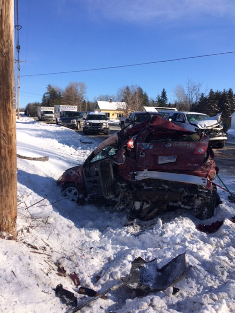 This red Nissan Rogue, being driven by Maureen Herlihy, of Walpole, Massachusetts, failed to stop at a stop sign and struck a white Toyota Tundra being driven by Morgan Huffman, of Ohio, on Sunday morning on Route 148 in Madison. Three people were injured.