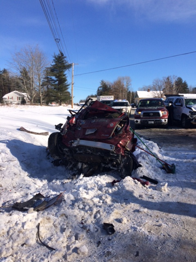 This red Nissan Rogue, being driven by Maureen Herlihy, of Walpole, Massachusetts, failed to stop at a stop sign and struck a white Toyota Tundra being driven by Morgan Huffman, of Ohio, on Sunday morning on Route 148 in Madison. Three people were injured.