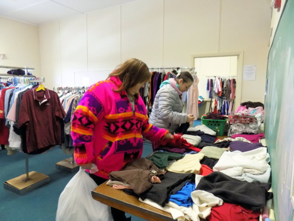Anna Crockett and Amber LeBlanc shop at The Free Store in Jay recently. Housed on the third floor of the St. Rose of Lima Parish Hall, the store provides free clothing, accessories and small household items. It is open most Saturdays from 9 a.m. to noon.