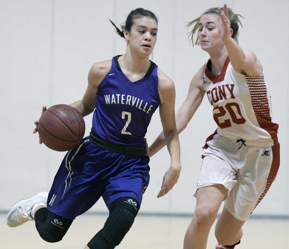 Cony senior MacKenzie Lewis defends Waterville's Paige St. Pierre during a Kennebec Valley Athletic Conference game Tuesday in Augusta.