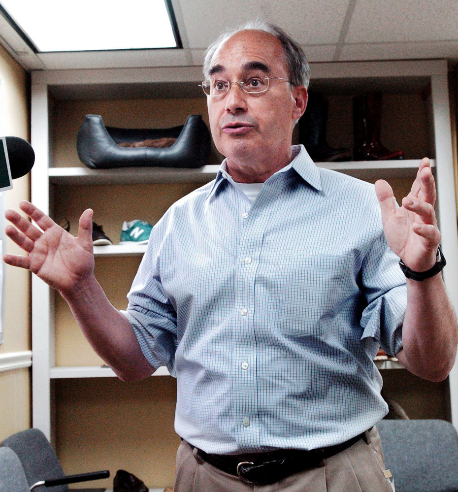 U.S. Rep. Bruce Poliquin, R-2nd District, pictured here following a tour of the Tasman Leather Group mill in Hartland on July 20, 2016, has released his legislative agenda for 2018 in an attempt to appeal to Maine's more moderate voters in a year in which he is up for re-election.