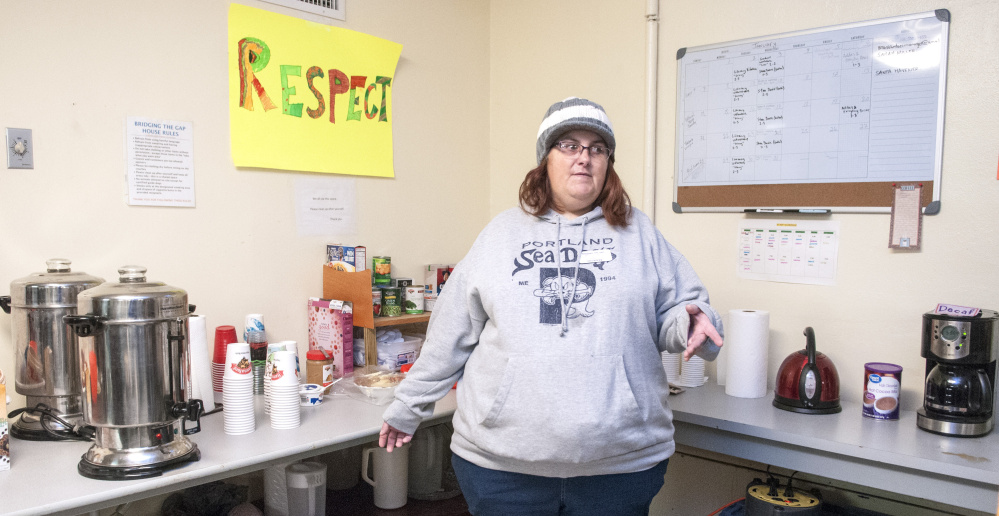 Melanie Scott stands in the coffee area Saturday in the Augusta Community Warming Center in the former St. Mark's Church parish hall on Pleasant Street in Augusta.