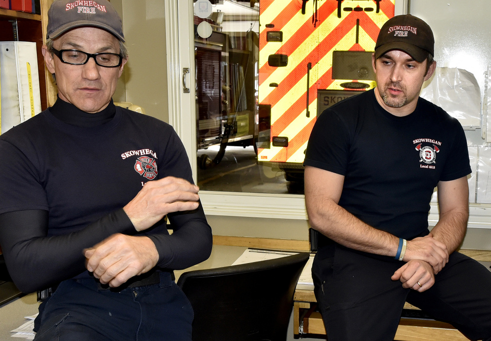 Skowhegan Fire Capt. Rick Caldwell, left, and firefighter Daryl Wyman speak Sunday about the discovery of William Lashon on Saturday who may have died from an electrical fire inside a theater room full of projection equipment, according to Wyman.