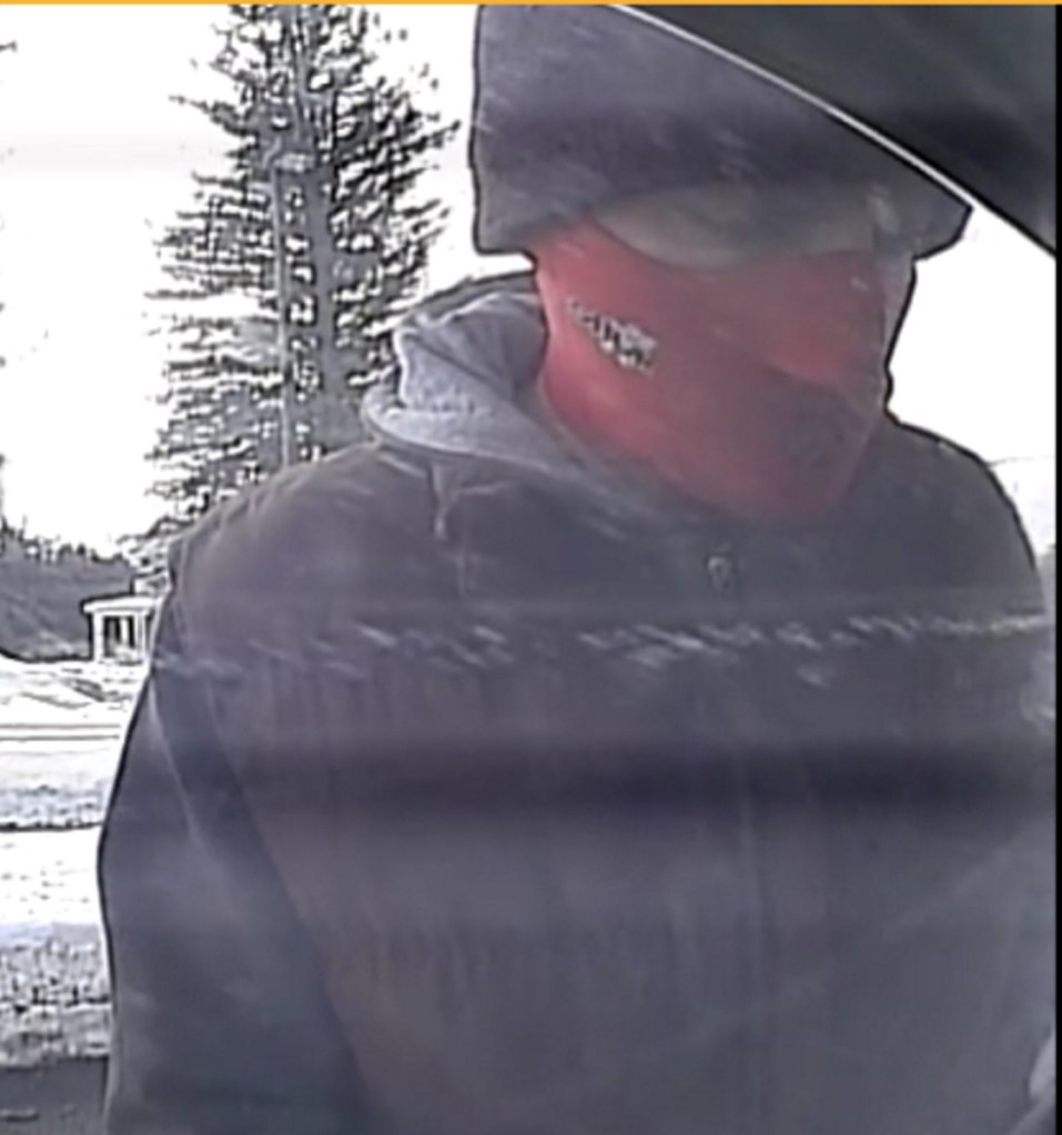 The robber appears on camera Tuesday at the Skowhegan Savings Bank branch in Norridgewock.