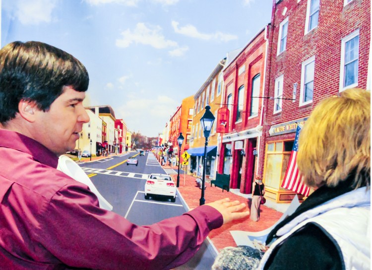 Assistant Project Manager Andrew Lathe, left, talks about sidewalks with Bonnie Kinsey on Wednesday in Hallowell City Hall during a Department of Transportation open house about a pending Water Street reconstruction project.