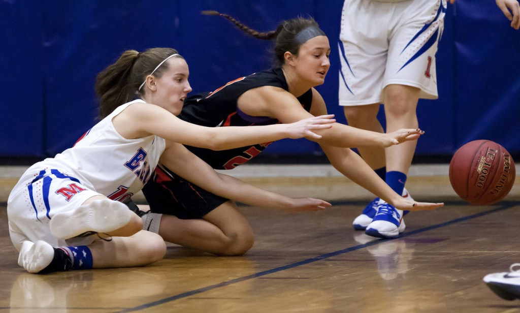 Messalonskee's Katie Seekins (left) and Gardiner's Aimee Adams battle for a loose ball during the first half of their Kennebec Valley Athletic Conference Class A game Thursday in Oakland.