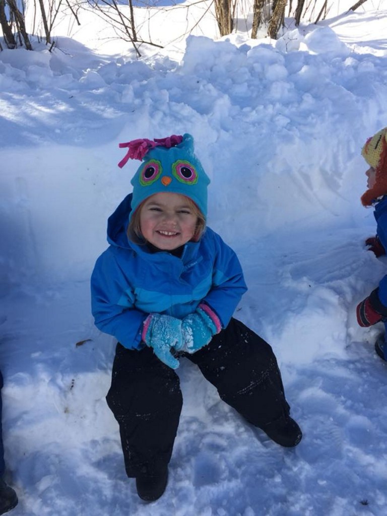 Anna Belliveau makes a face while playing outside at Conley Connections daycare in Skowhegan.