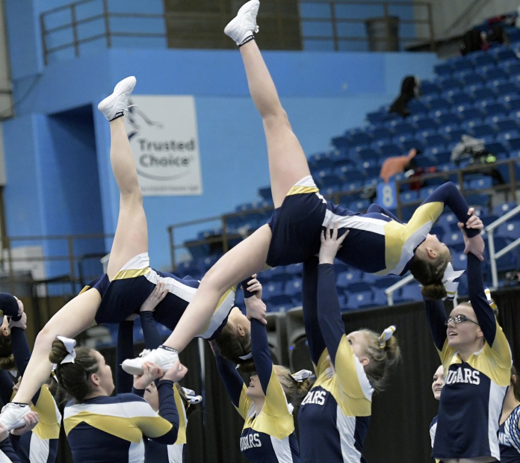 Mt. Blue cheerleaders compete during the Kennebec Valley Athletic Conference championships Monday in Augusta.