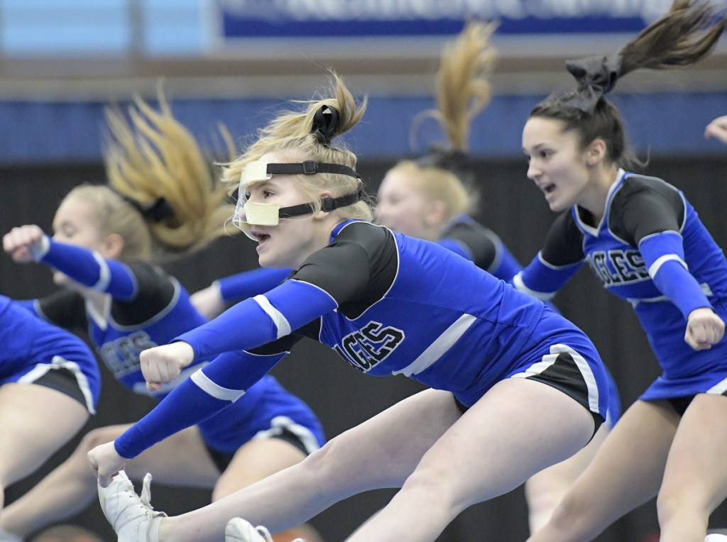Erskine cheerleaders do their routine during the Kennebec Valley Athletic Conference championships Monday in Augusta.