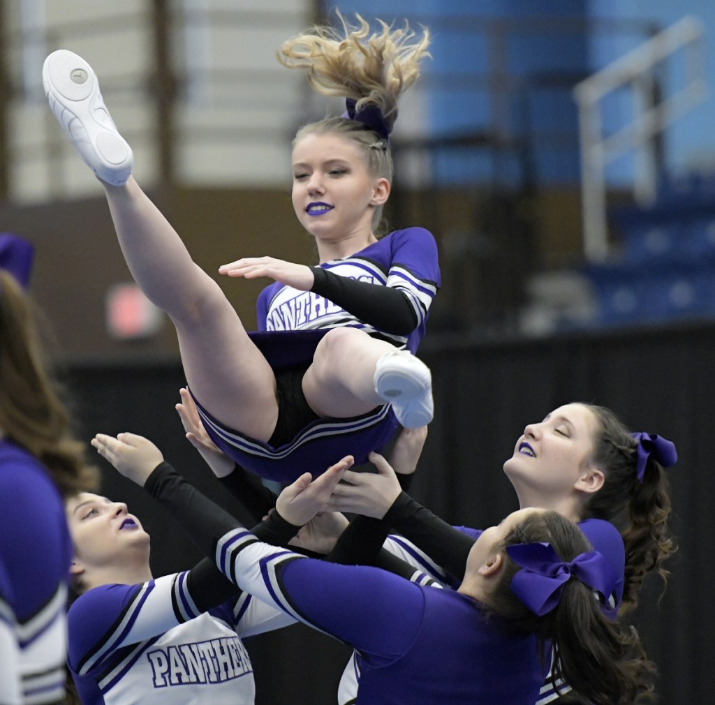 Waterville cheerleaders compete during the Kennebec Valley Athletic Conference championships Monday in Augusta.