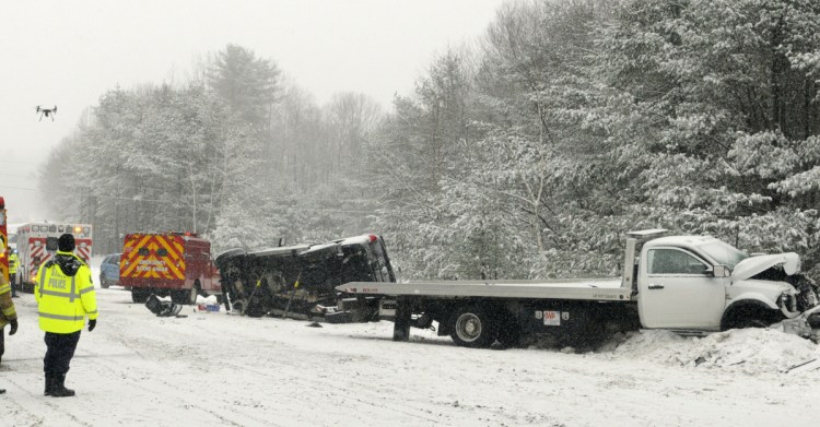 A Maine State Police drone comes down for a landing after recording the scene of deadly vehicle collision on U.S. Route 202 on Wednesday in Winthrop.