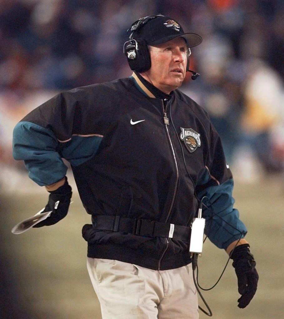 In this Jan. 12, 1997 photo, Jacksonsville head coach Tom Coughlin looks on from the sidelines as his team plays the New England Patriots in the AFC Championship game in Foxborough, Massachusetts.