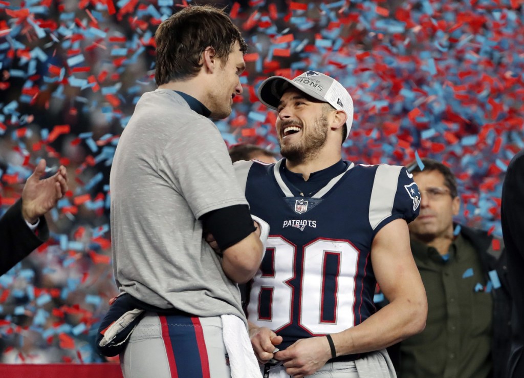 New England Patriots quarterback Tom Brady, left, speaks to wide receiver Danny Amendola after the AFC championship  game Sunday against the Jaguars in Foxborough, Massachusetts. The Patriots won 24-20.