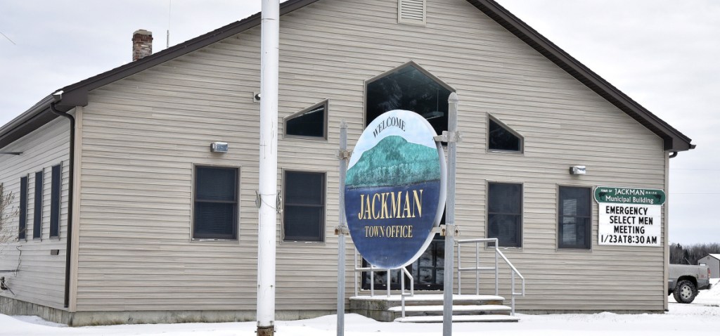 The Jackman Town Office displays a sign Monday announcing an emergency selectmen's meeting for 8:30 a.m. Tuesday to address the status of Town Manager Thomas Kawczynski.
