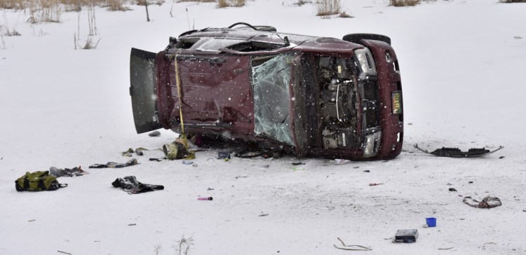 An overturned Chevy Trailblazer lies on the ice early Monday on a small pond along U.S. Route 2 in Skowhegan. Desiree Strout died as a result of the accident, and the baby she was carrying was delivered by Caesarean section at Redington-Fairview Hospital in Skowhegan.
