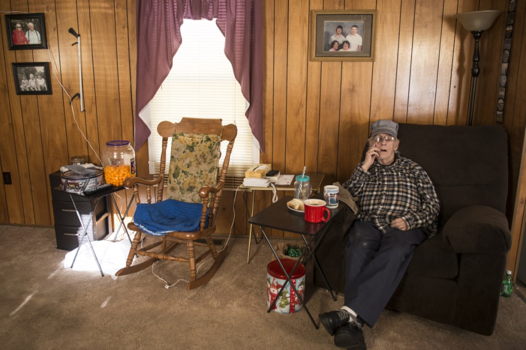 Richard Sukeforth sits for a portrait Friday, Jan. 26, at his daughter's mobile home in Holden. Sukeforth has been living there since he was evicted from his home in 2015.
