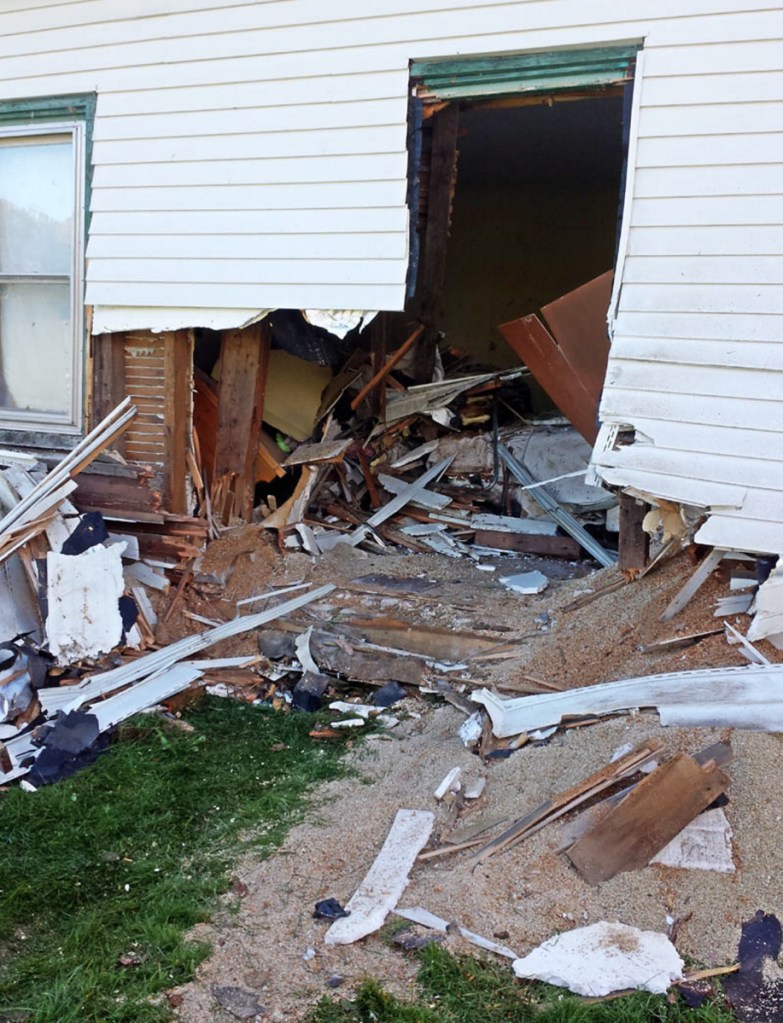 A Oldsmobile crashed through this Belgrade home on Knowles Road on Oct. 10, 2013.