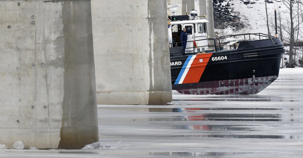 USCG ice breaker on Sunday busts beneath the bridge spanning the Kennebec River between Richmond and Dresden.