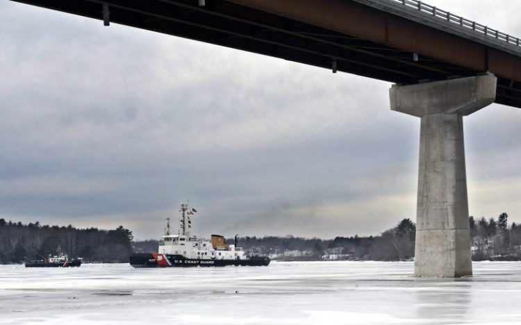 The USCG cutter Penobscot Bay and USCG ice breaker arrive Sunday at the bridge spanning the Kennebec River between Richmond and Dresden.