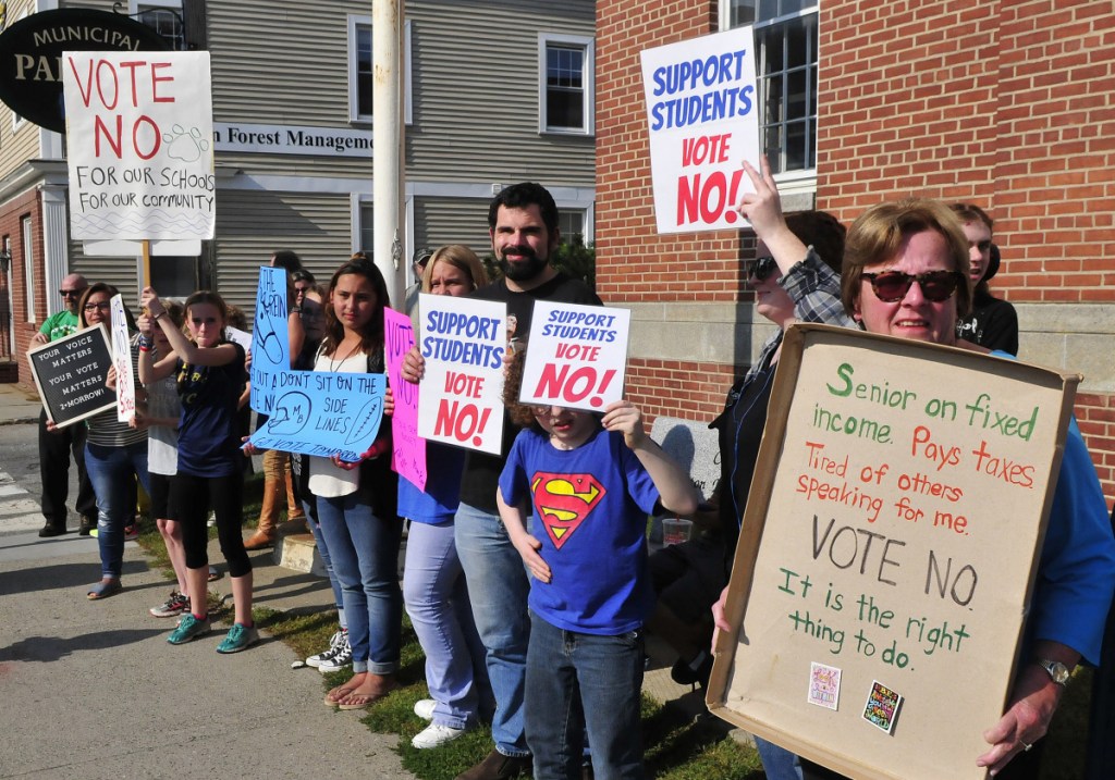 Last year four referenda were held on the RSU 9 school budget. In the third referendum on Sept. 11, 2017, students, parents and residents, including Julia Hennessy, right, turned out on Main Street in Farmington to urge voters to vote no on the school budget, saying proposed cuts would hurt students in a variety of programs. The budget finally passed on the fourth vote.