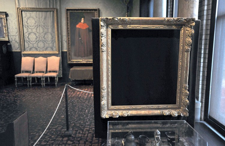 Empty frames from which thieves took a Rembrandt and a Vermeer, remain on display at the Isabella Stewart Gardner Museum as shown in this 2010 photo.