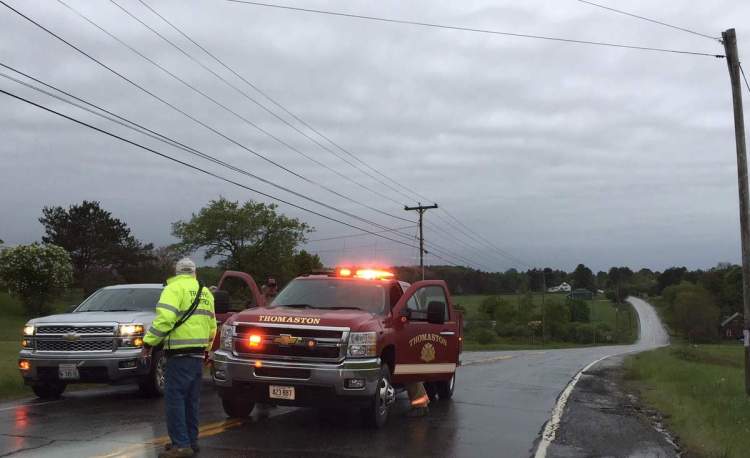 A Thomaston fire vehicle arrives at the scene of the crash that killed 21-year-old Zachary Elwell of St. George. 