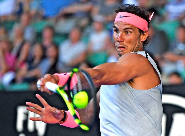 Spain's Rafael Nadal makes a forehand return to Argentina's Leonardo Mayer during their second round match at the Australian Open tennis championships in Melbourne Wednesday.
