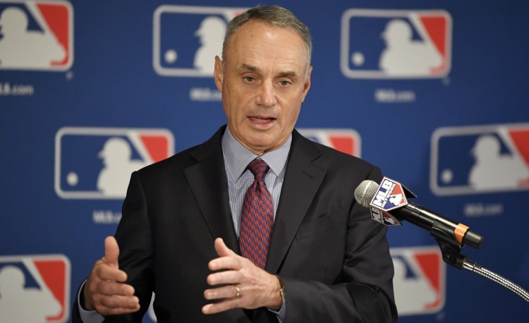 Major League Baseball Commissioner Rob Manfred says there will be a pitch clock in 2019 if the average time of a nine-inning game is higher than 2:55 this year.