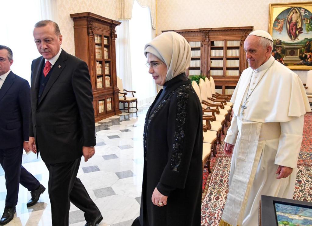 Turkish President Recep Tayyip Erdogan, left, and his wife, Emine, center, meet Pope Francis at the Vatican on Monday. Erdogan is the first Turkish president to visit the Vatican in nearly six decades. Francis met with him during his 2014 trip to Istanbul.