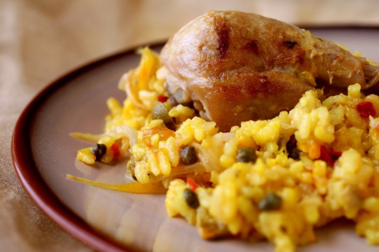 Chicken with Saffron Rice. To serve, place a chicken thigh and drumstick, with some of the rice mixture, on each of four dinner plates. Add Tabasco sauce if you like.