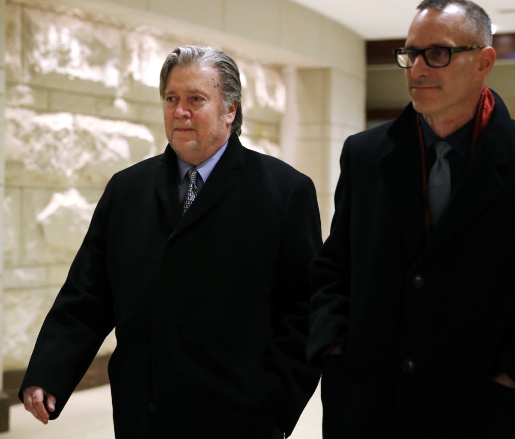 Former White House strategist Steve Bannon, left, has been summoned to appear before House investigators, but says the White House will only let him answer 14 yes or no questions.
Associated Press/Jacquelyn Martin