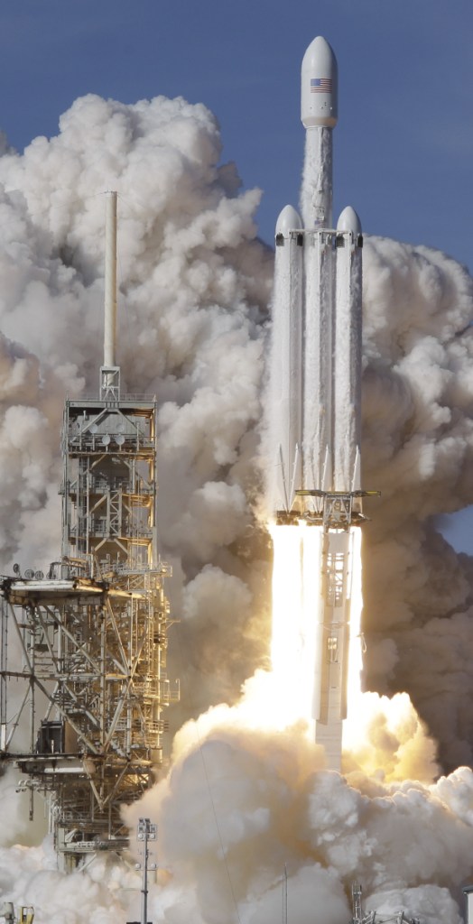 A SpaceX Falcon Heavy rocket lifts off from the Kennedy Space Center in Cape Canaveral, Fla., on Tuesday.