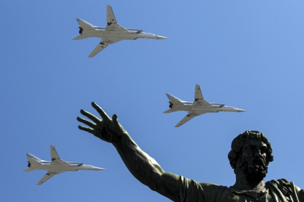 Long-range bombers fly by during a Victory Day military parade in Moscow in 2016. An ally of President Vladimir Putin says it appears that a renewed arms race could develop.