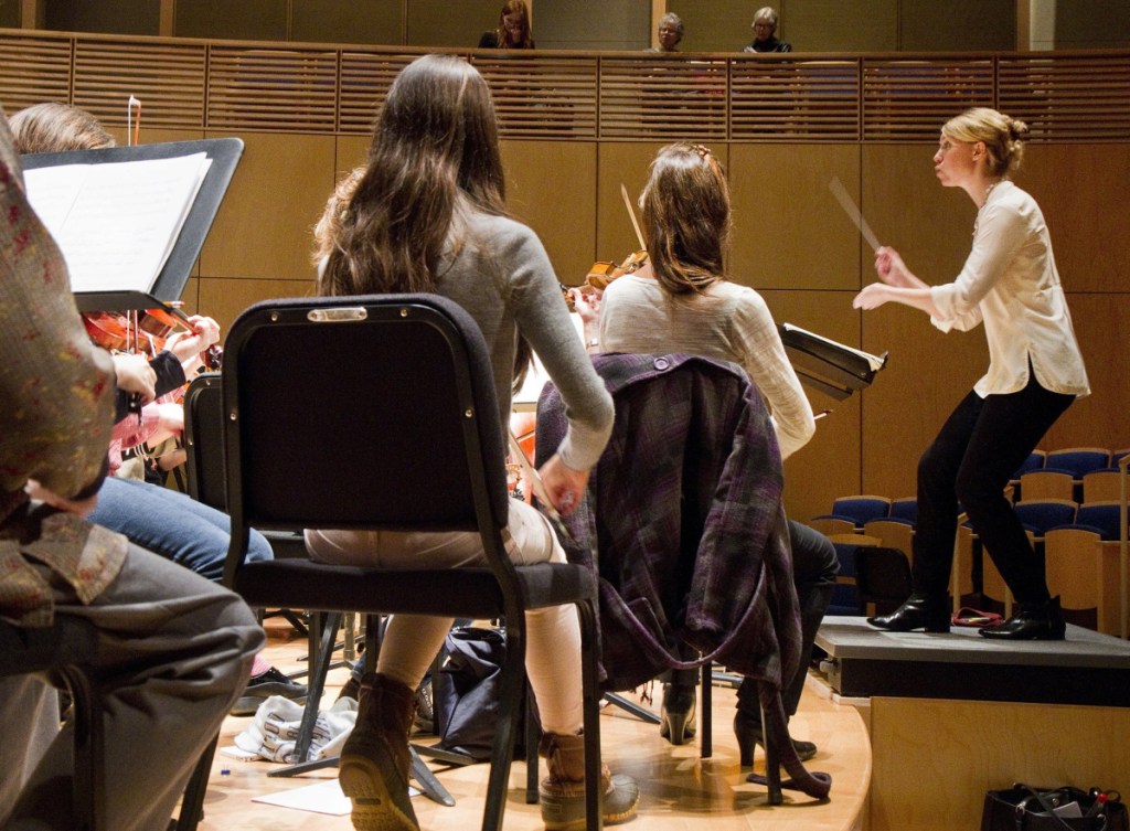 Director Emily Isaacson leads the Oratorio Chorale and the Bowdoin College Chorus during a rehearsal at the college's Studzinski Recital Hall in 2014. She will be artistic director for one of two Bach festivals in Portland in June.
Staff file photo by Carl D. Walsh